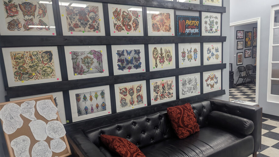 Traditional Tattoo Shop with Tattoo Flash on The Walls